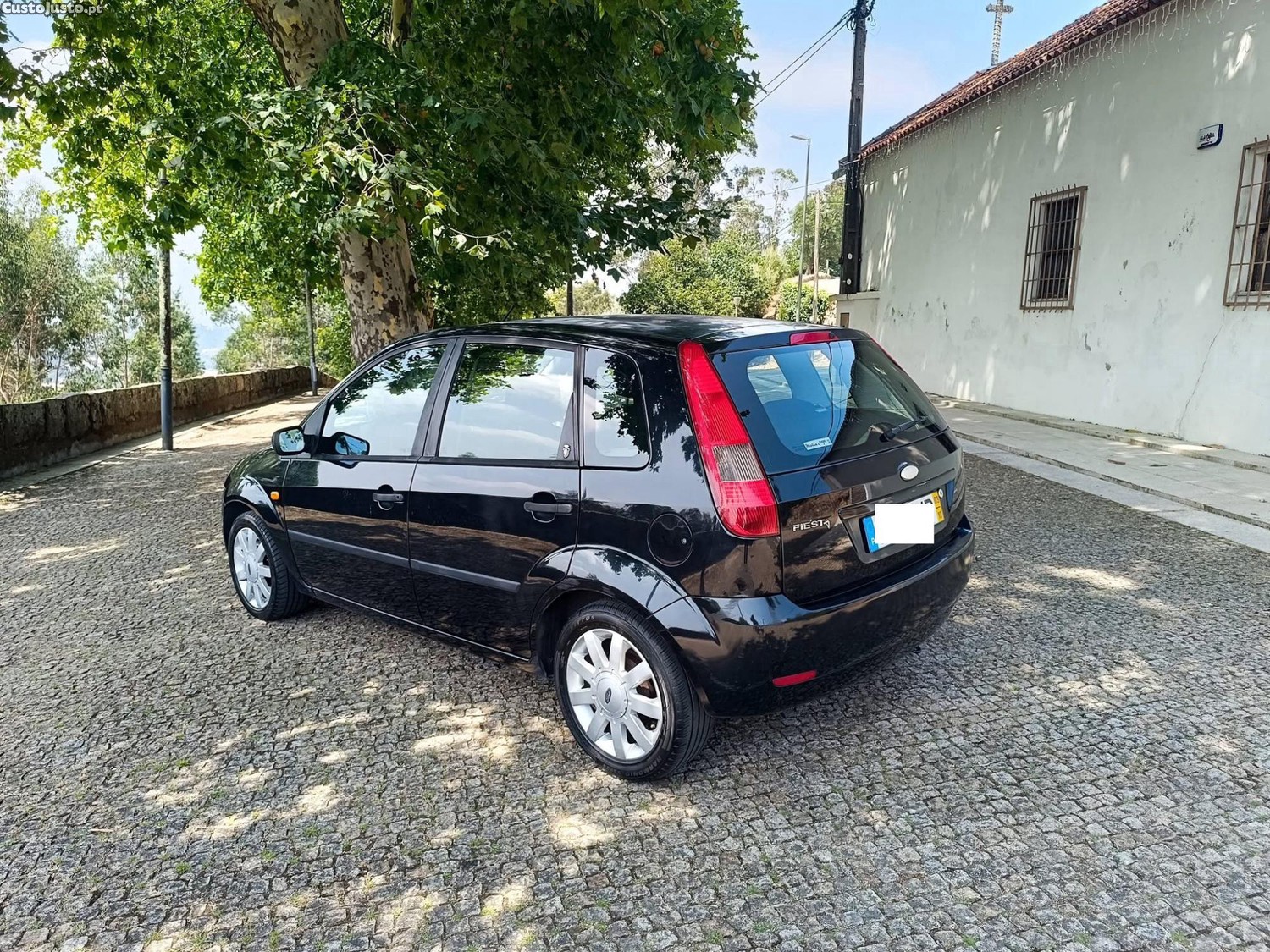 Ford Fiesta 1.25c/ revisão — fotografia 15