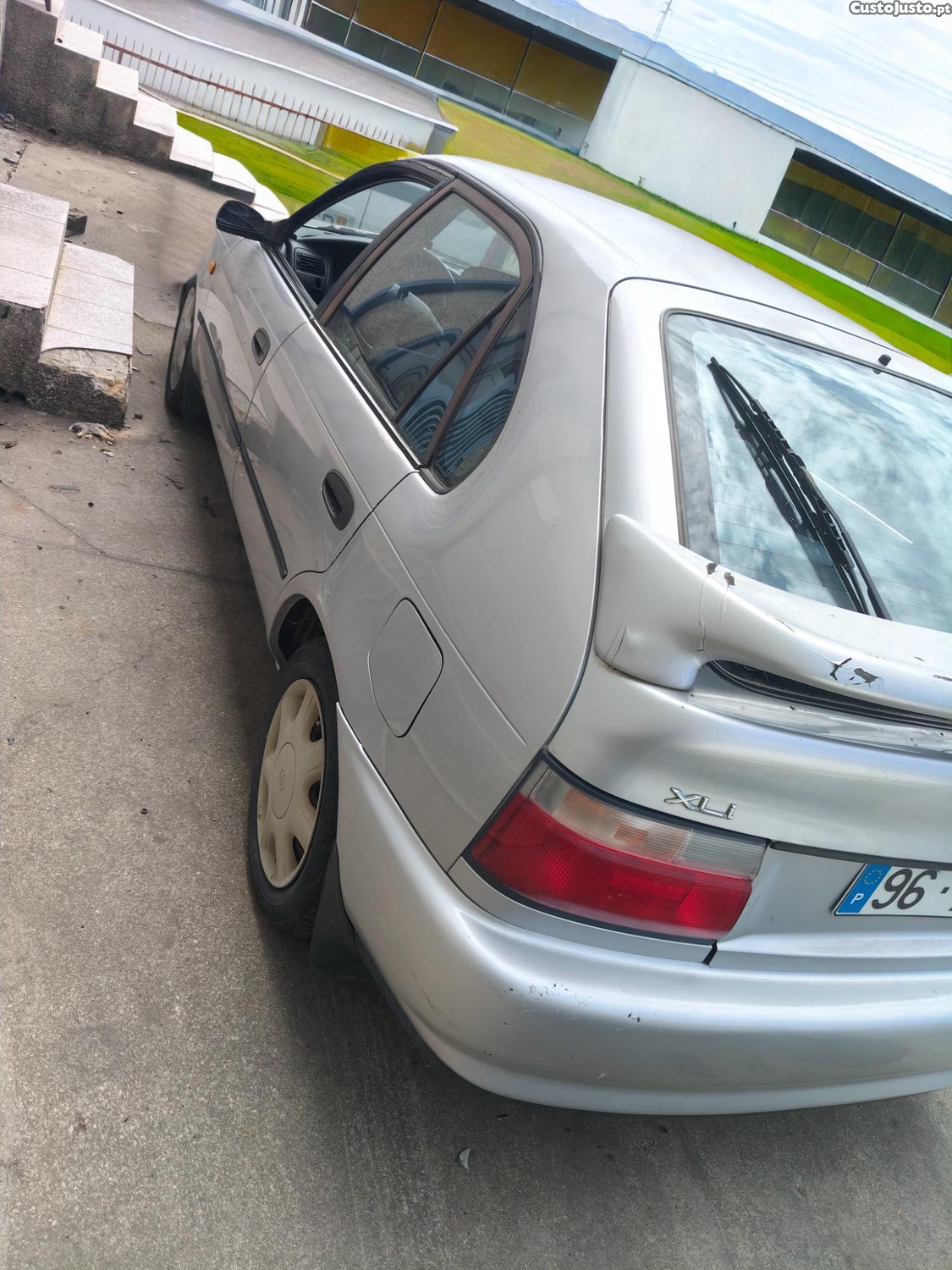 Toyota Corolla Xli com ar-condicionado 4 vidros elétricos — fotografia 5