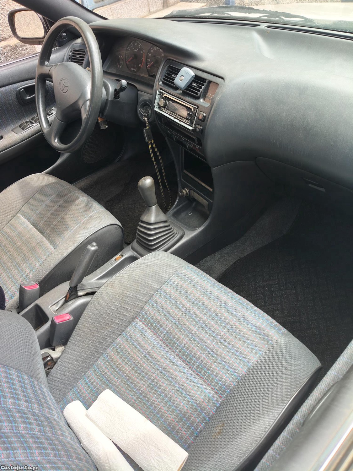 Toyota Corolla Xli com ar-condicionado 4 vidros elétricos — fotografia 4