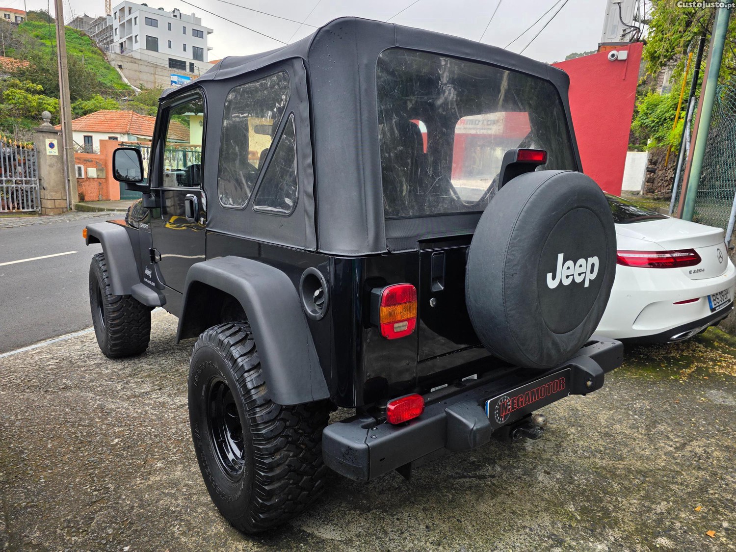 Jeep Wrangler 2.4 SPORT SOFT TOP - 06 — photo 4