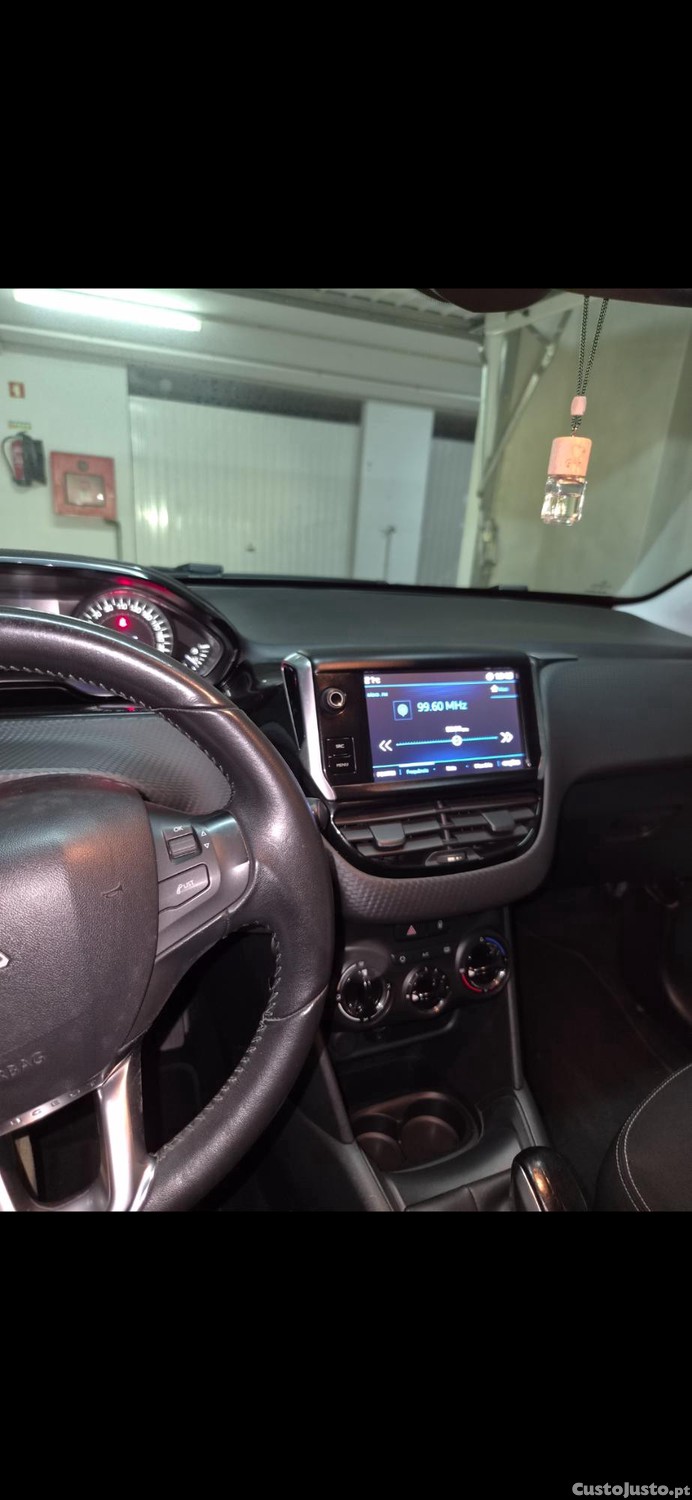 Peugeot 208 Versão 1.2 Pure Tech Style - 17 — photo 4