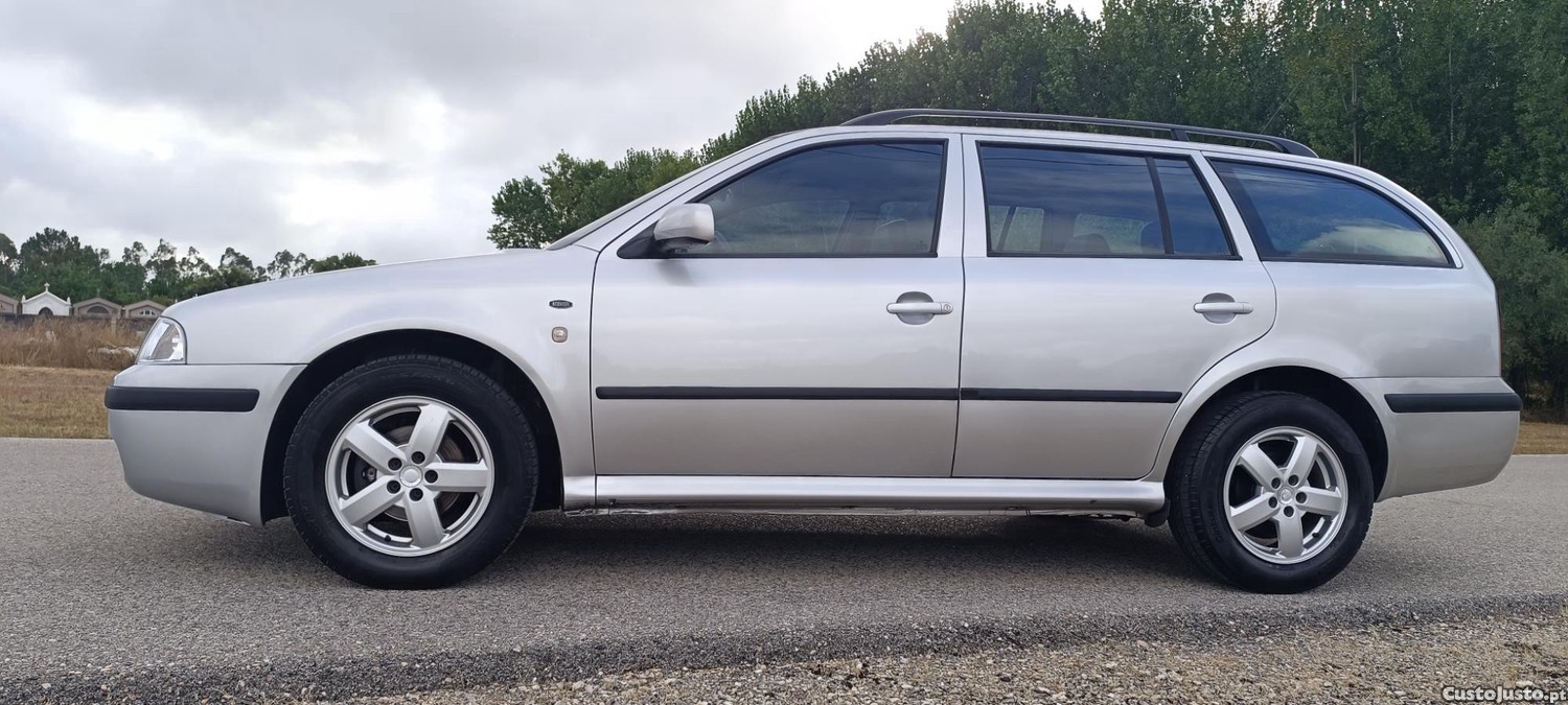 Skoda Octavia Break 1.6i Ambient - BOM ESTADO — fotografia 7