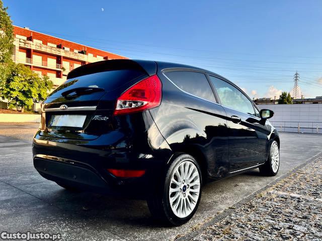 Ford Fiesta 1.25i 16V TITANIUM PLUS+ 82CV | COMO NOVO | BLUETOOTH | MÃOS LIVRES | USB | VIDROS PRIVACY — fotografia 9