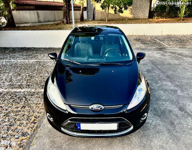 Ford Fiesta 1.25i 16V TITANIUM PLUS+ 82CV | COMO NOVO | BLUETOOTH | MÃOS LIVRES | USB | VIDROS PRIVACY — fotografia 10