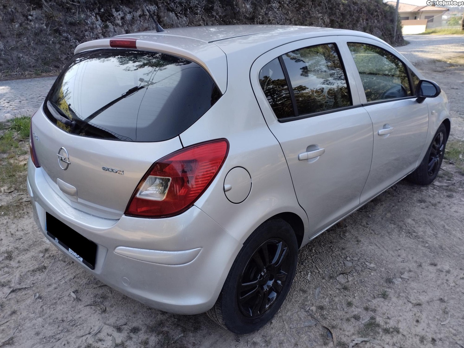 Opel Corsa D 1.3 CDTI 95cv - 5 Lugares - A/C - NACIONAL "Economico" — fotografia 17