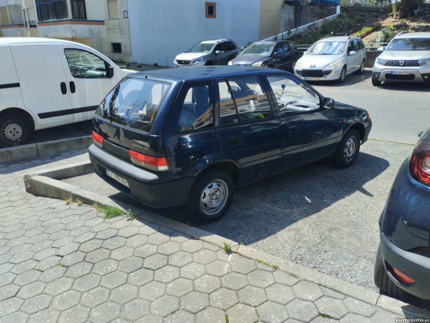 Suzuki Swift 1.0 — photo 3