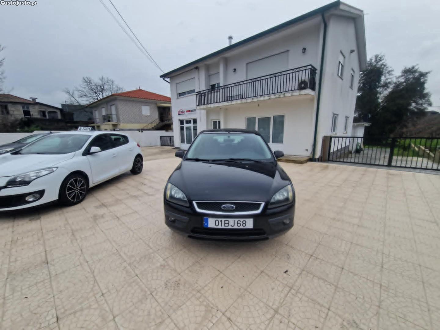 Ford Focus 1.6 Ti-VCT Ghia — fotografia 10