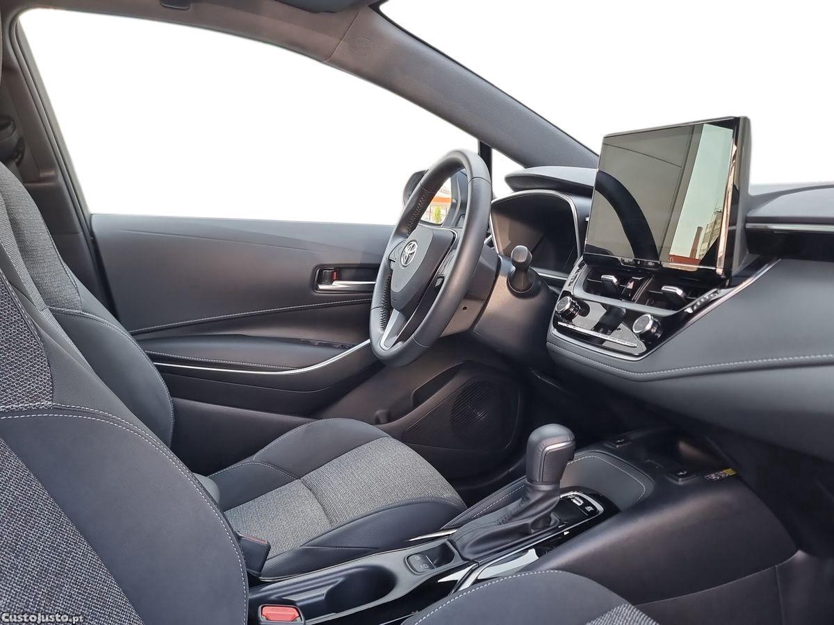 Toyota Corolla TS 1.8 Hybrid Comfort Plus — fotografia 11