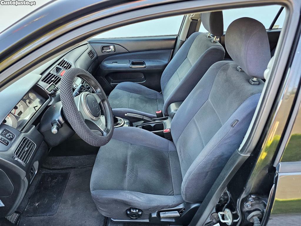 Mitsubishi Lancer Sw 1.6i 100cv a GPL 01/2005 — fotografia 10