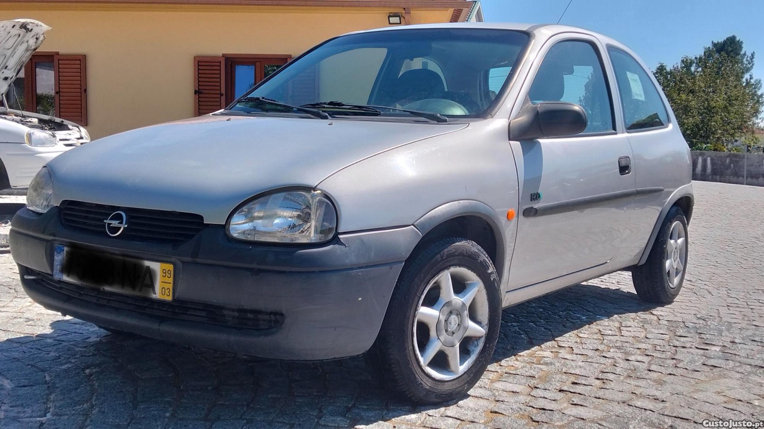 Opel Corsa 1.0 1999 — fotografia 7
