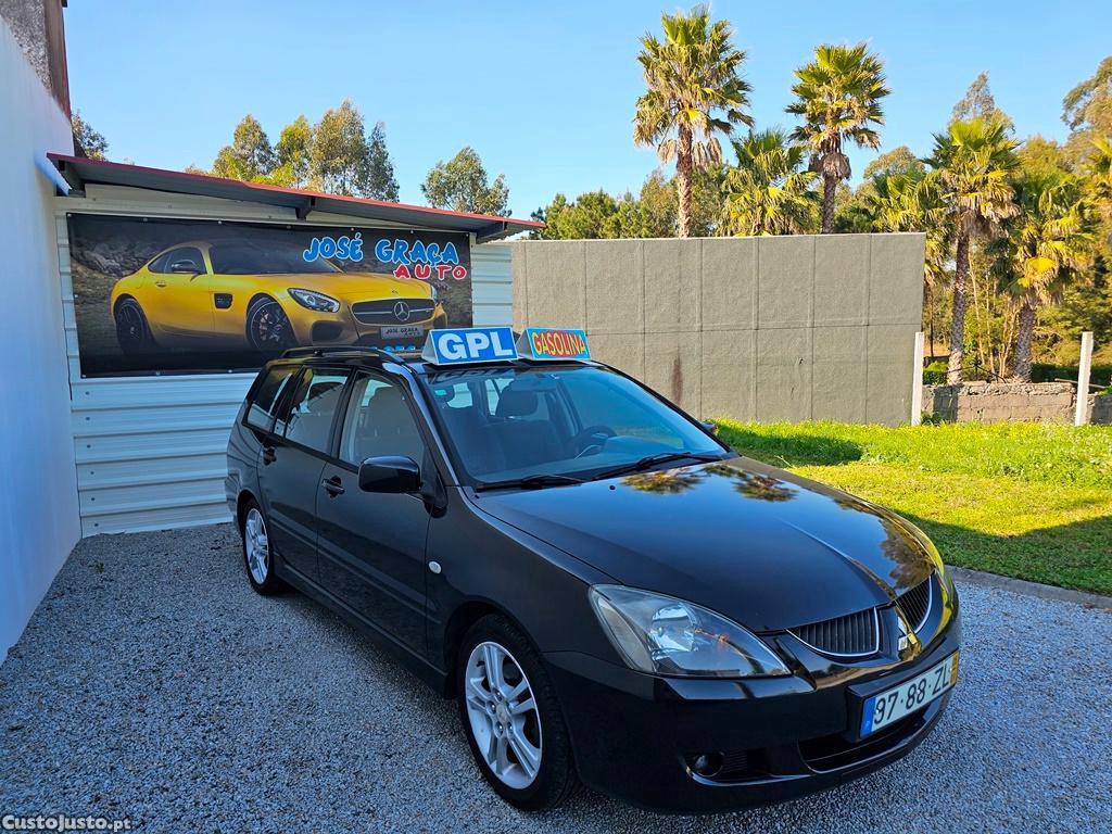 Mitsubishi Lancer Sw 1.6i 100cv a GPL 01/2005 — fotografia 16