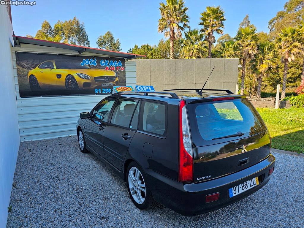 Mitsubishi Lancer Sw 1.6i 100cv a GPL 01/2005 — fotografia 14