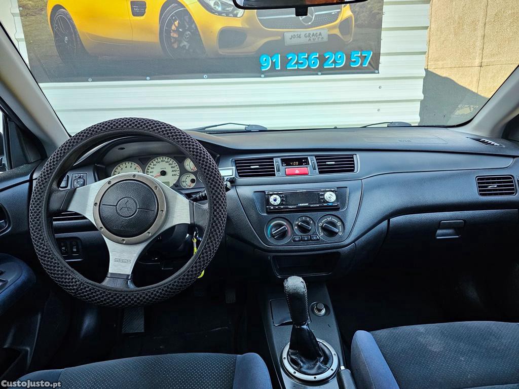 Mitsubishi Lancer Sw 1.6i 100cv a GPL 01/2005 — fotografia 8