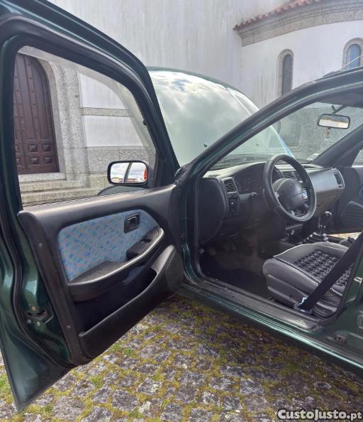 Nissan Almera I Hatchback N15 1.4 - 96 foto 4
