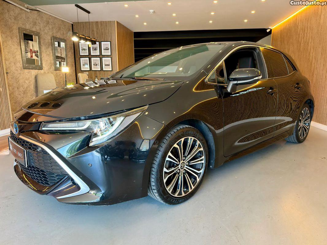 Toyota Corolla 1.8 Hybrid Exclusive — fotografia 14